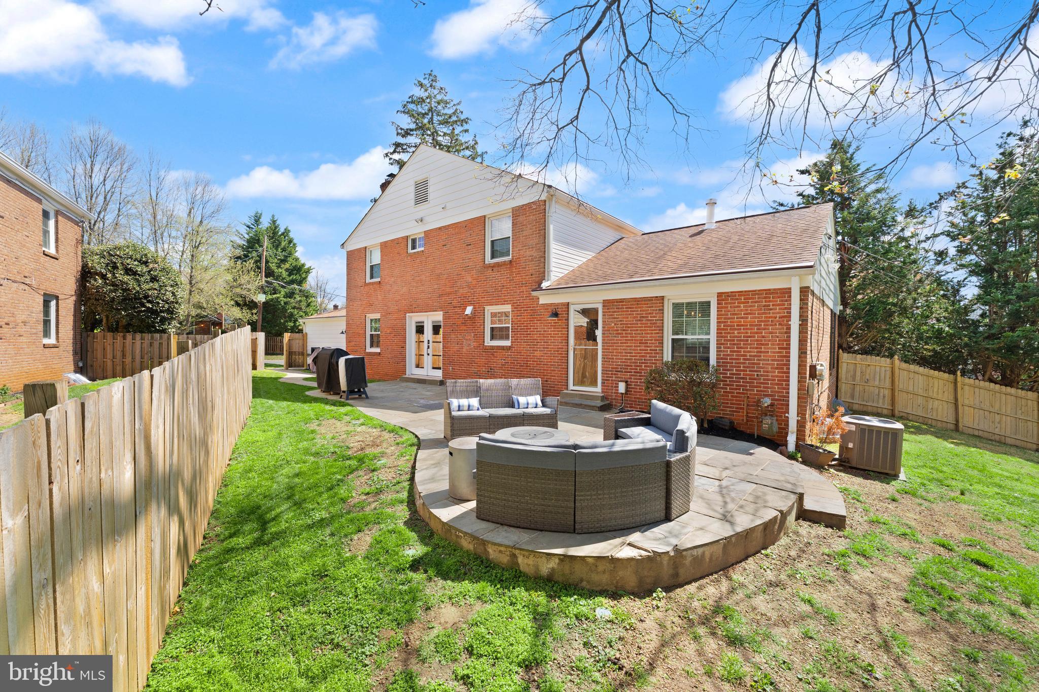 8501 Aqueduct Road Potomac, MD 20854 - Photo 47 of 54 a view of a house with backyard and sitting area