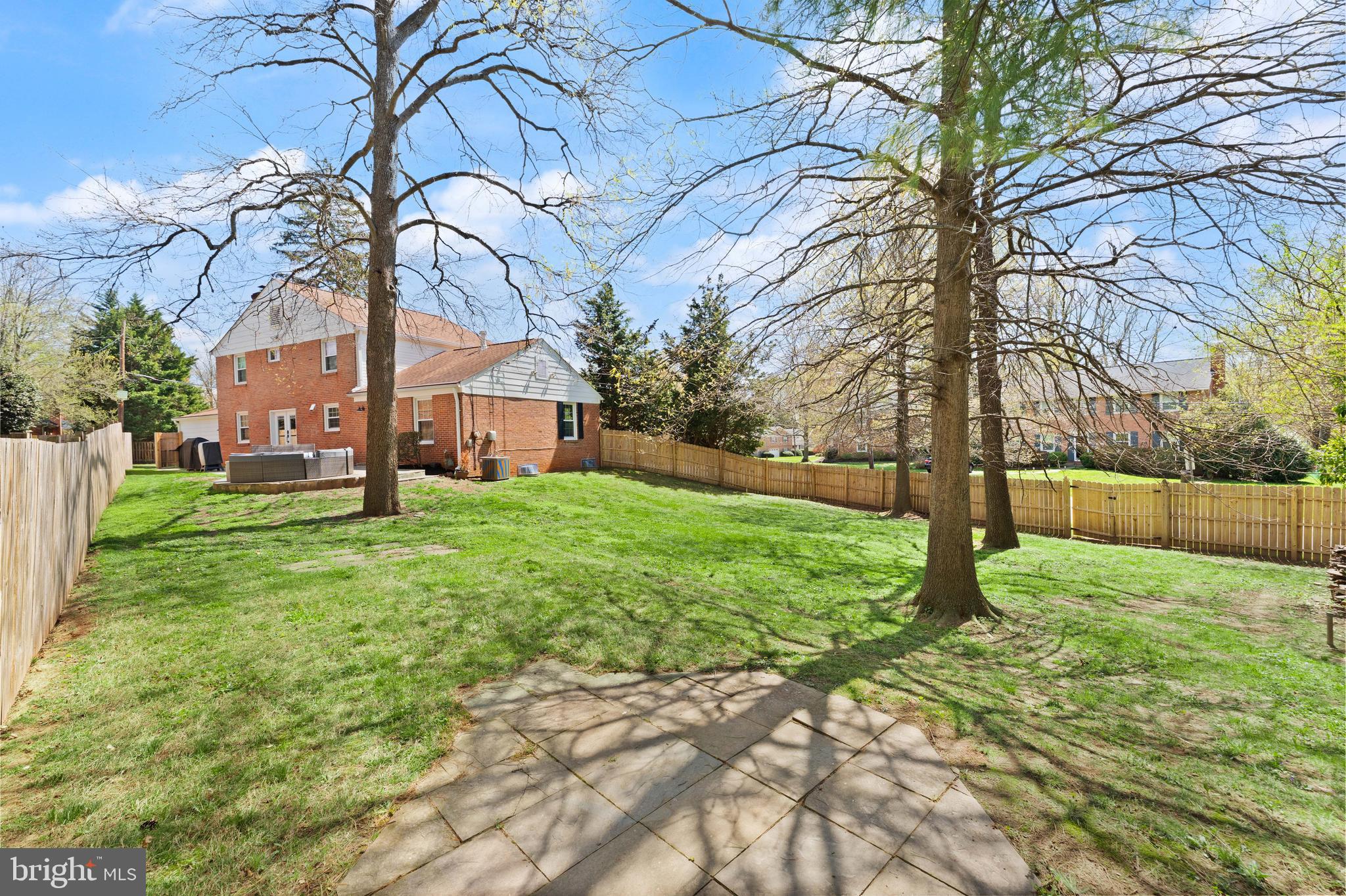 8501 Aqueduct Road Potomac, MD 20854 - Photo 50 of 54 a view of a backyard with a tree