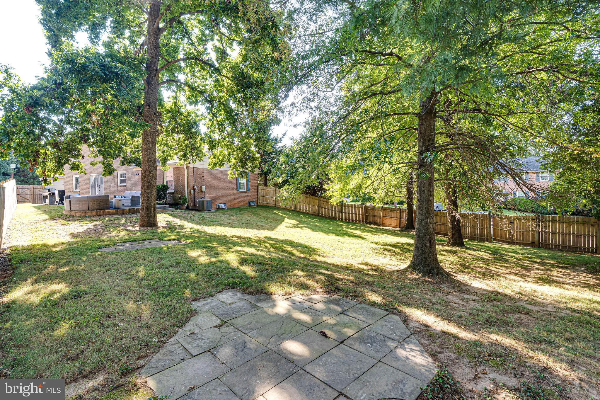 8501 Aqueduct Road Potomac, MD 20854 - Photo 55 of 75 a view of a yard with a tree