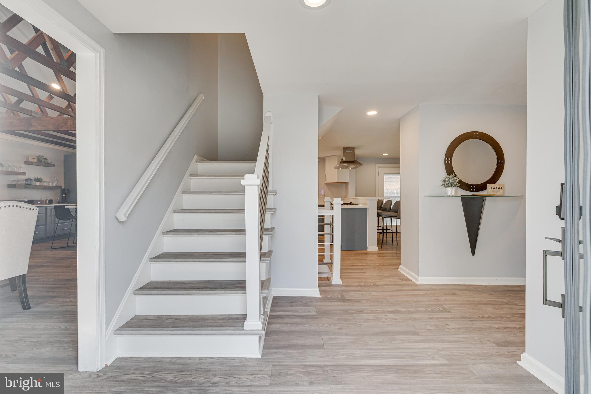 8501 Aqueduct Road Potomac, MD 20854 - Photo 10 of 75 a view of entryway and hall with wooden floor
