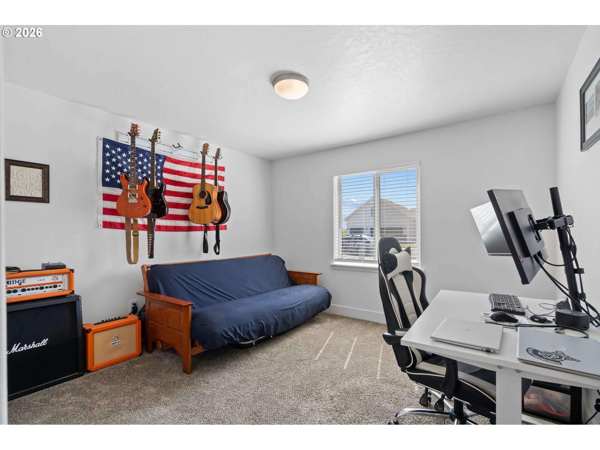 306 Sage Street Boardman, OR 97818 - Photo 14 of 24 a living room with furniture and a window