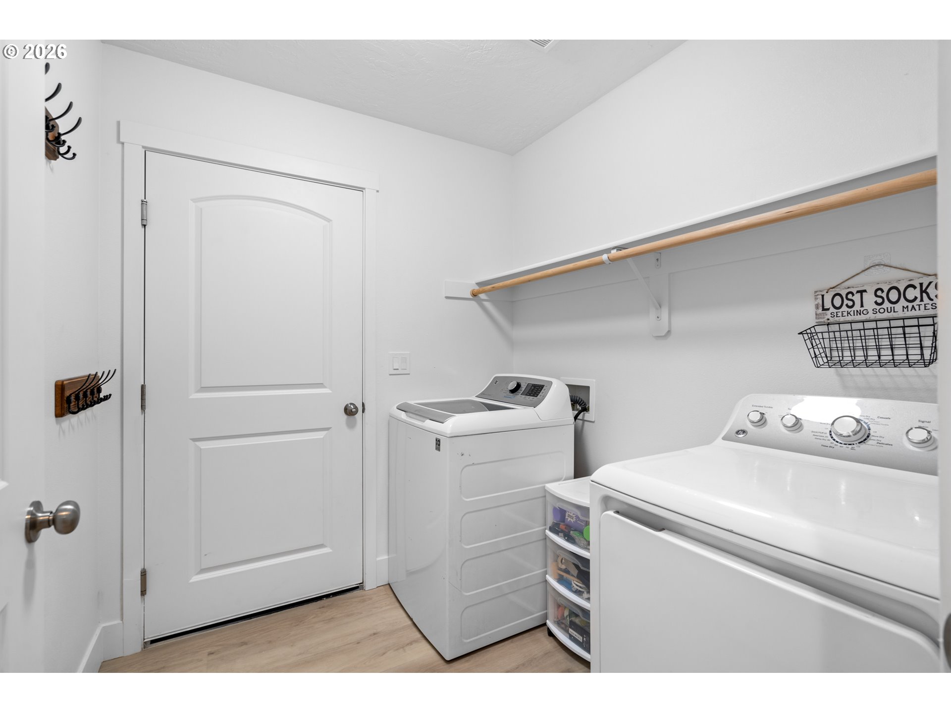 306 Sage Street Boardman, OR 97818 - Photo 17 of 24 a utility room with dryer and washer