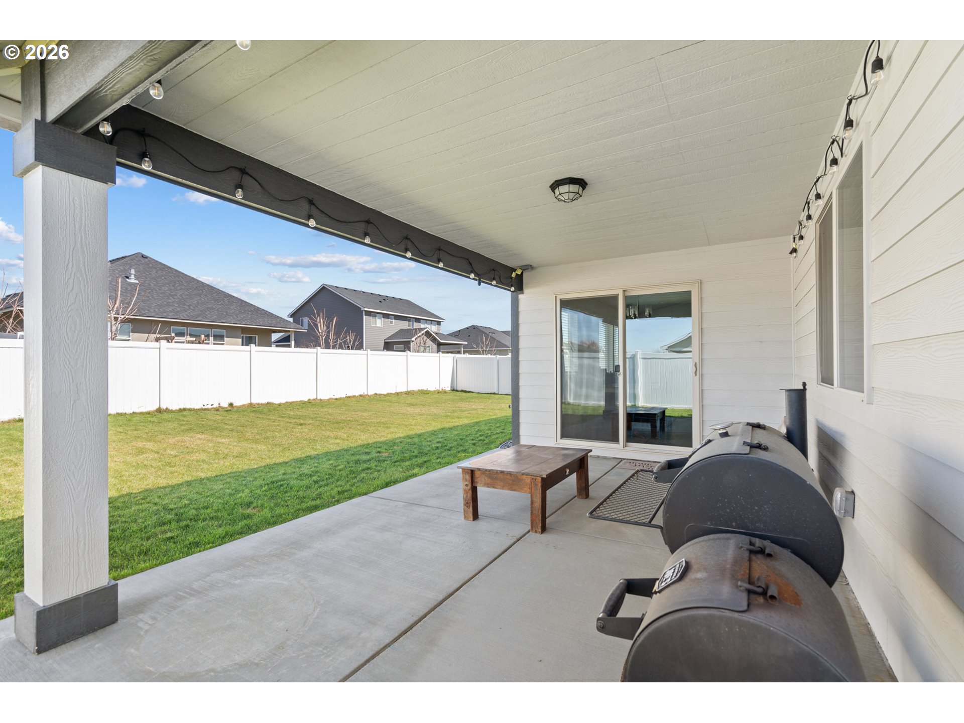 306 Sage Street Boardman, OR 97818 - Photo 19 of 24 a living room with yard floor to ceiling window and yard