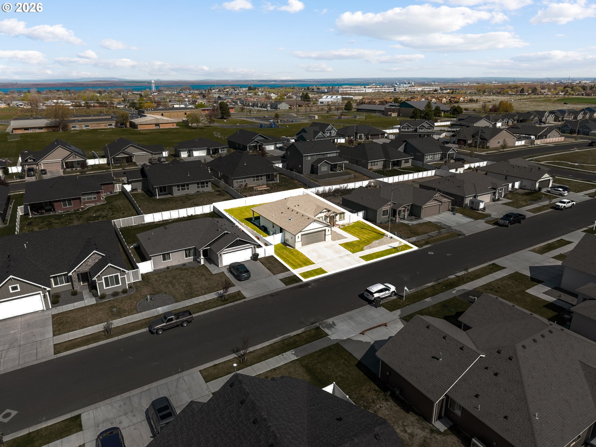 306 Sage Street Boardman, OR 97818 - Photo 22 of 24 an aerial view of residential houses with city view