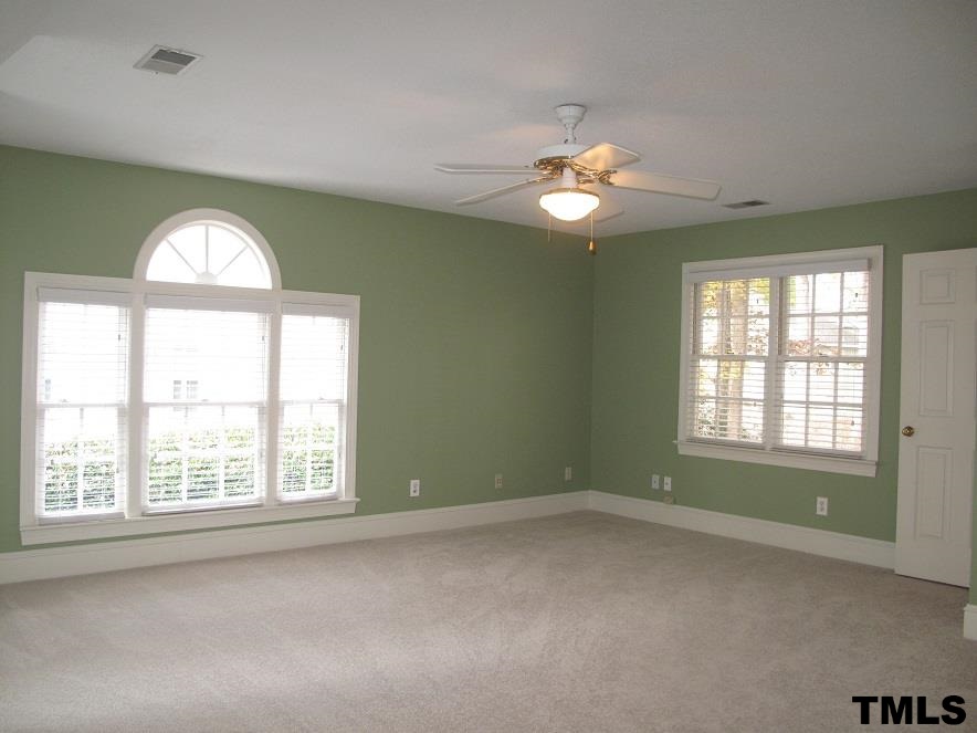 2812 Hawtree Drive Raleigh, NC 27613 - Photo 18 of 22 an empty room that has a window