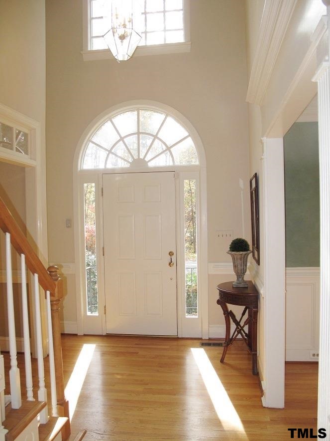 2812 Hawtree Drive Raleigh, NC 27613 - Photo 2 of 22 a view of an entryway with wooden floor and door