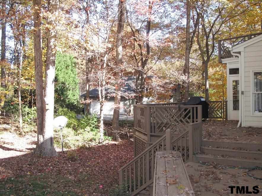 2812 Hawtree Drive Raleigh, NC 27613 - Photo 22 of 22 a view of street along with trees