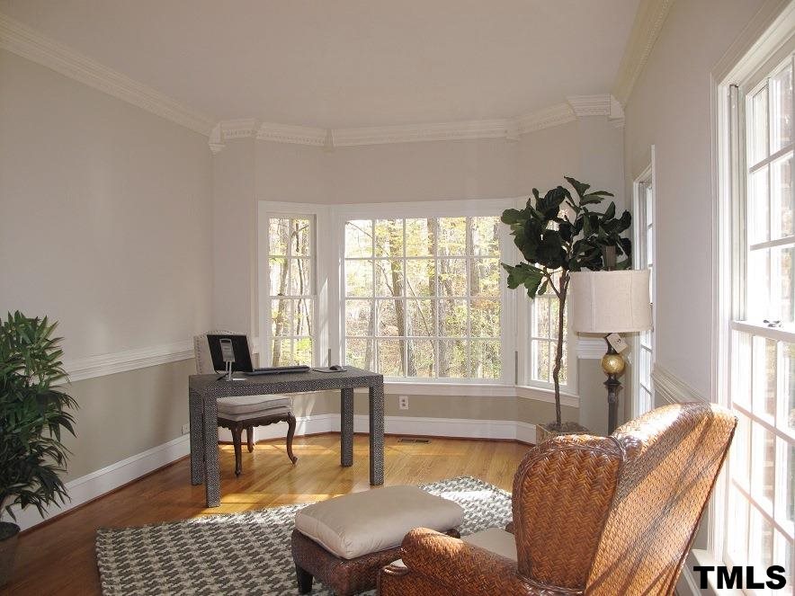 2812 Hawtree Drive Raleigh, NC 27613 - Photo 5 of 22 a living room with furniture and a window