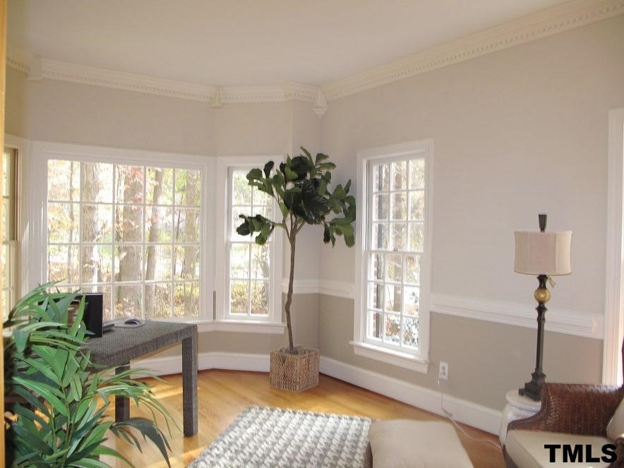 2812 Hawtree Drive Raleigh, NC 27613 - Photo 6 of 22 a living room with furniture and a window