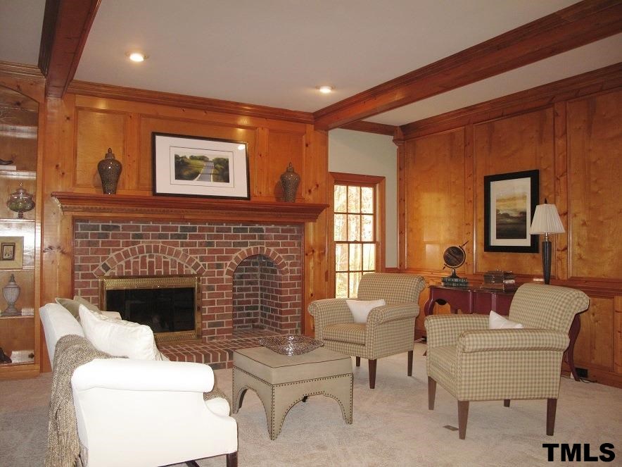 2812 Hawtree Drive Raleigh, NC 27613 - Photo 7 of 22 a living room with furniture and a fireplace