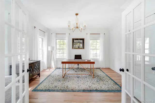 a kitchen with stainless steel appliances granite countertop a stove top oven a sink a counter space and cabinets