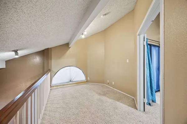 a view of a livingroom with a staircase