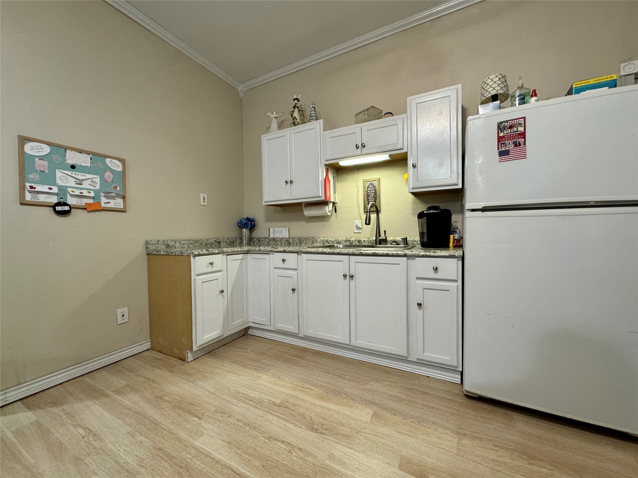 307 Deerwood Drive Trinity, TX 75862 - Photo 15 of 27 Off the kitchenette is the utility room area.