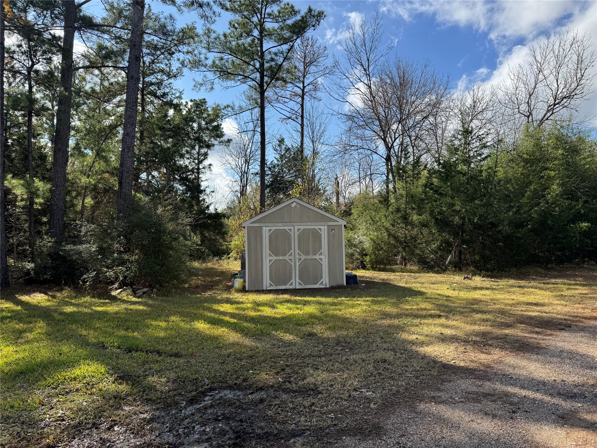 307 Deerwood Drive Trinity, TX 75862 - Photo 26 of 27 Storage shed
