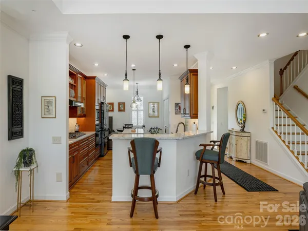 a view of a kitchen and dining room