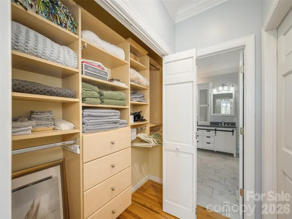 a view of kitchen and wooden floor
