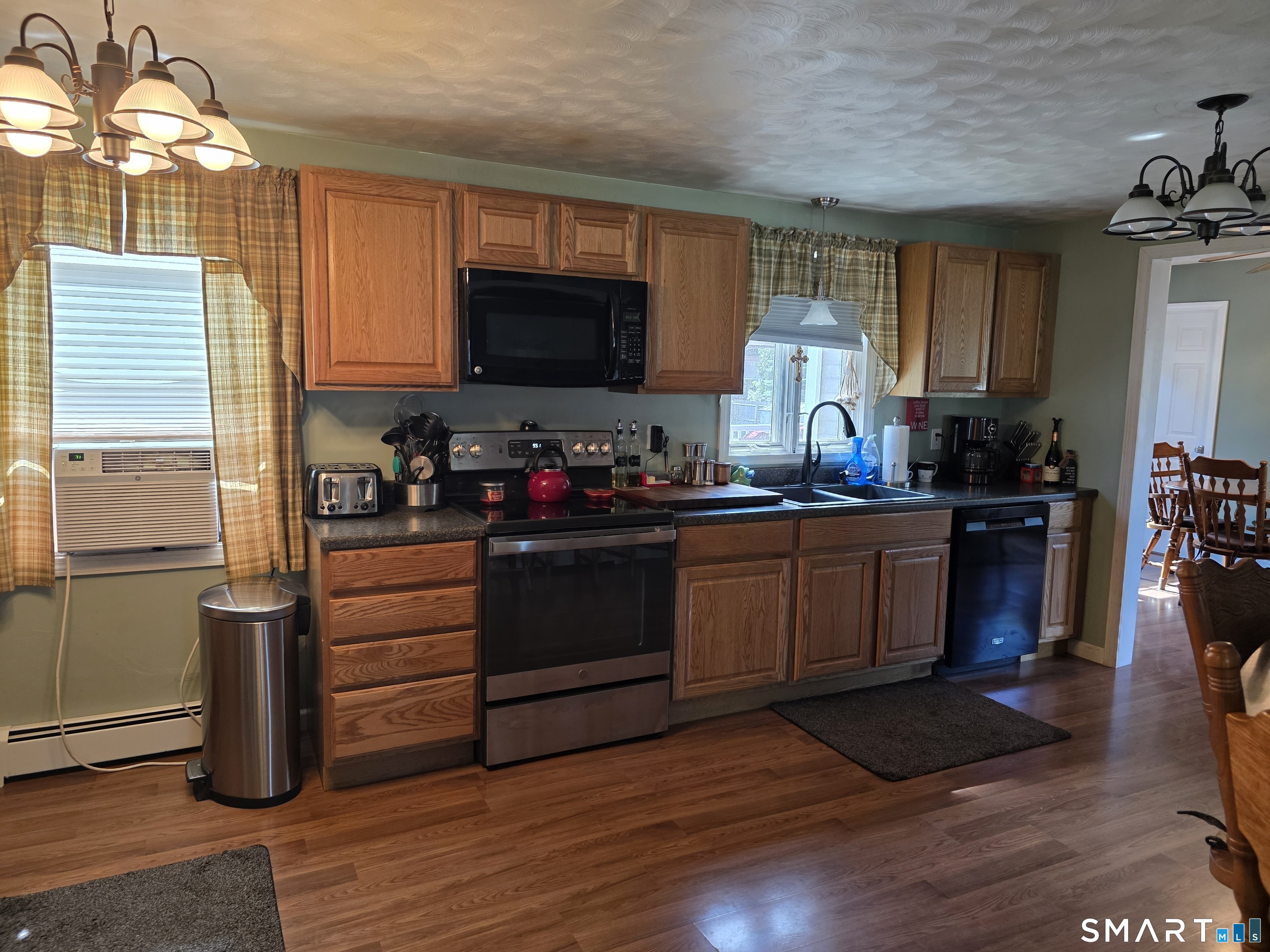 15 Van Buren Road Enfield, CT 06082 - Photo 21 of 40 a kitchen with a sink cabinets and window