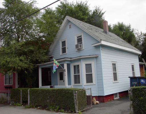 10 High Rock Street Lynn, MA 01902 - Photo 1 of 1 a front view of a house with a garden