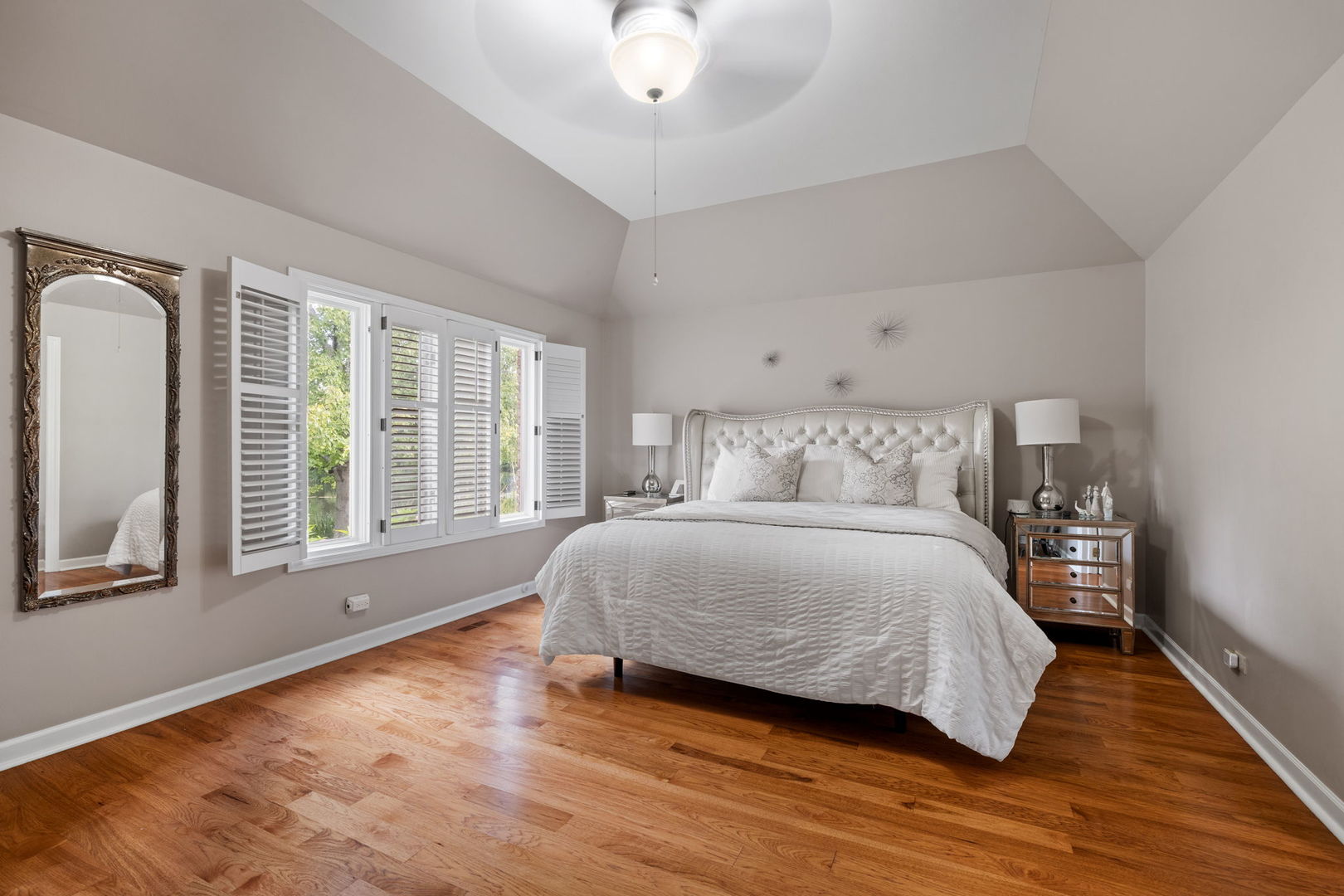 55 Chesterfield Court Burr Ridge, IL 60527 - Photo 15 of 34 a bedroom with a large bed and a large window