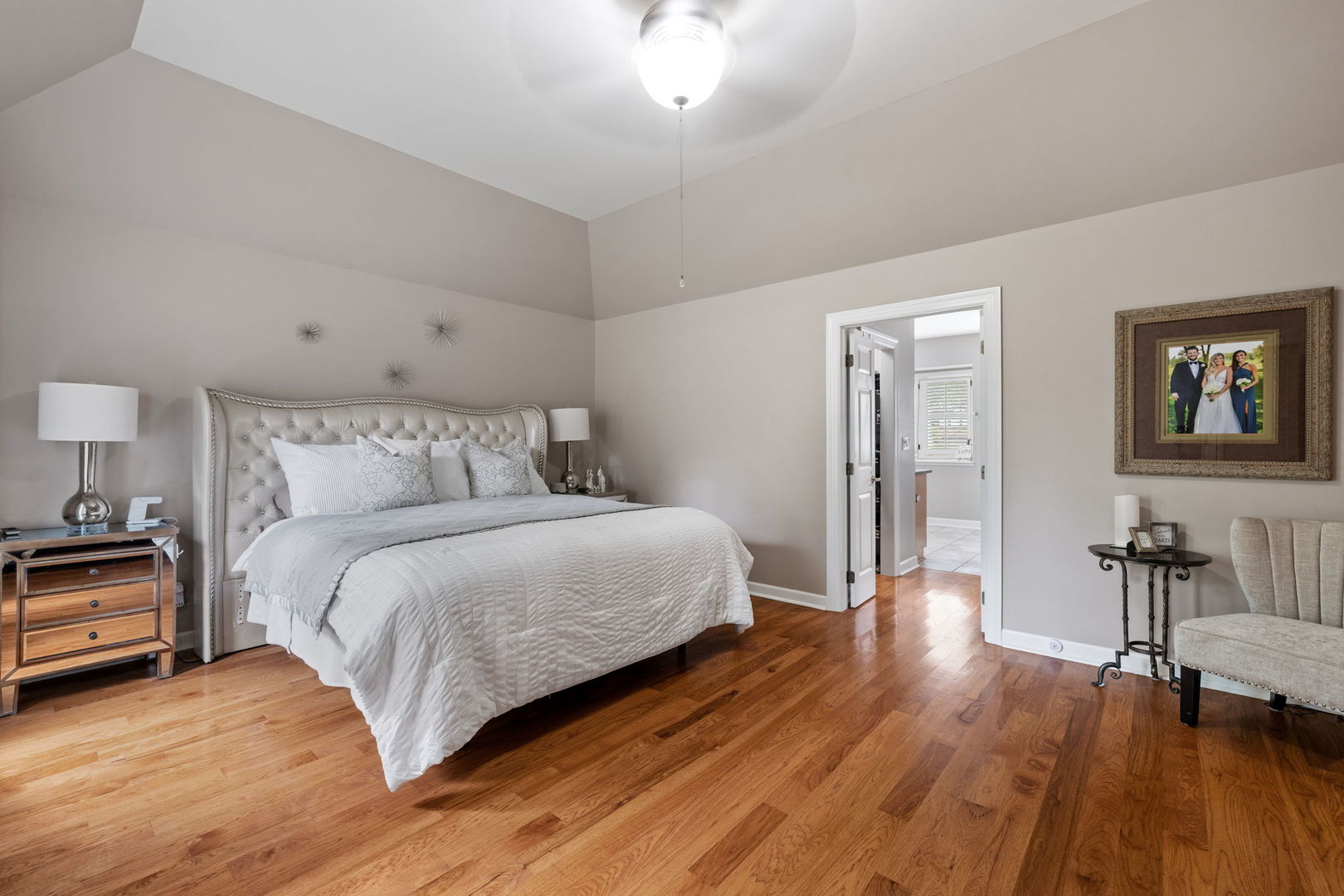 55 Chesterfield Court Burr Ridge, IL 60527 - Photo 16 of 34 a bedroom with a bed and wooden floor