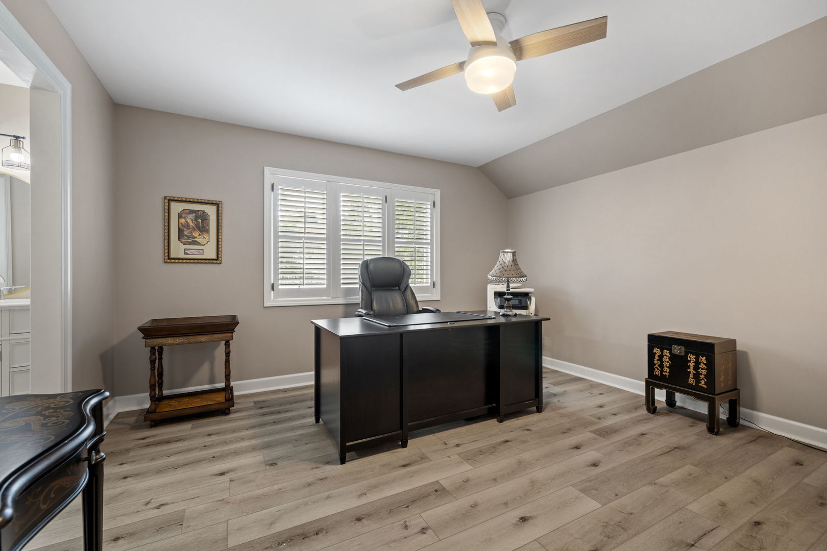 55 Chesterfield Court Burr Ridge, IL 60527 - Photo 25 of 34 a workspace with furniture hardwood and a window