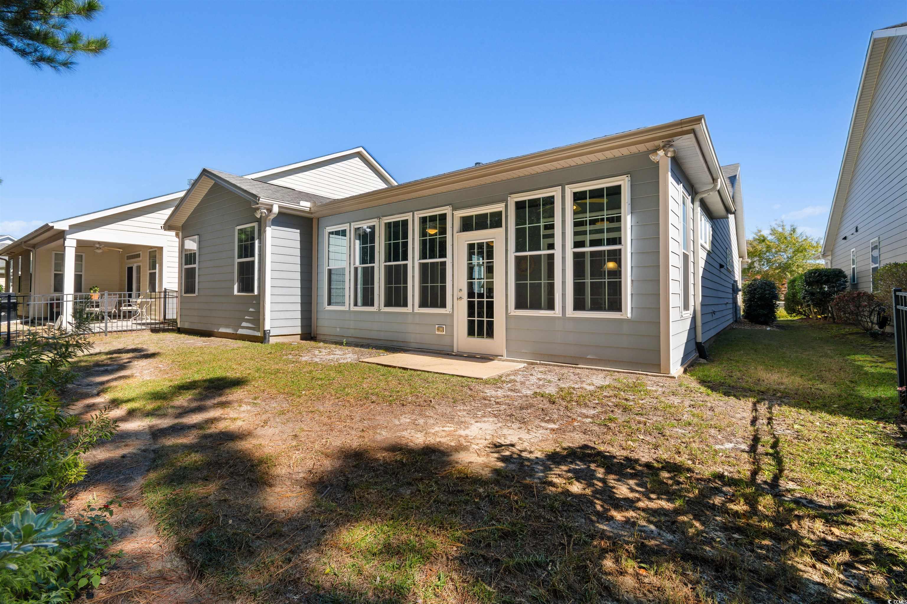 1573 Culbertson Avenue Myrtle Beach, SC 29577 - Photo 26 of 40 Rear view of property with a patio