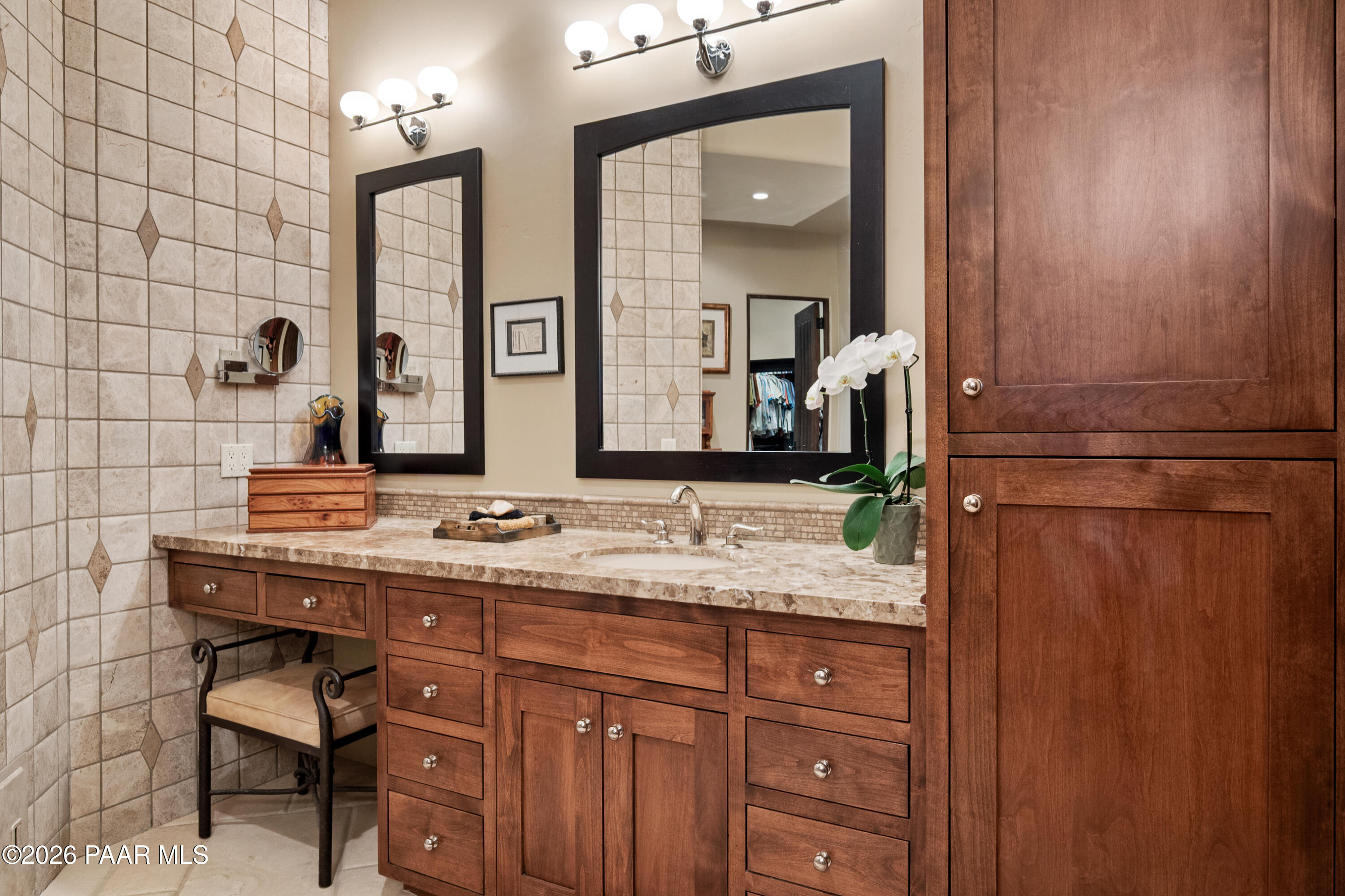 1515 High Valley Ranch Road Prescott, AZ 86303 - Photo 42 of 76 a bathroom with a granite countertop sink and a mirror
