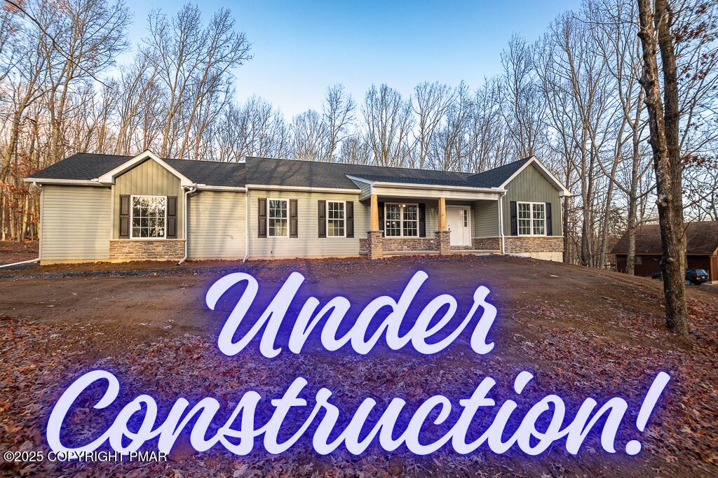 226 Apache Drive Effort, PA 18330 - Photo 1 of 3 a front view of a house