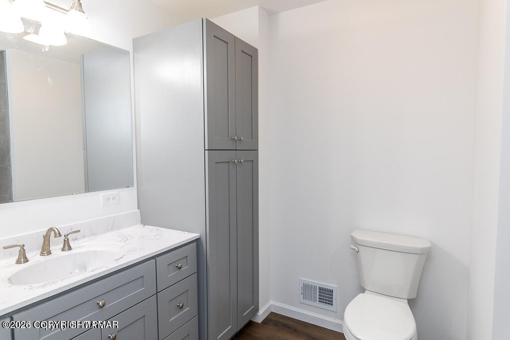 226 Apache Drive Effort, PA 18330 - Photo 17 of 30 a bathroom with a toilet sink and mirror