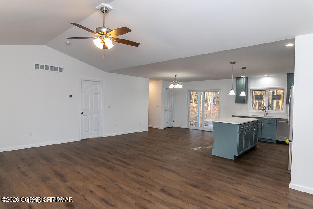 226 Apache Drive Effort, PA 18330 - Photo 3 of 30 a large kitchen with a large counter space and wooden floor