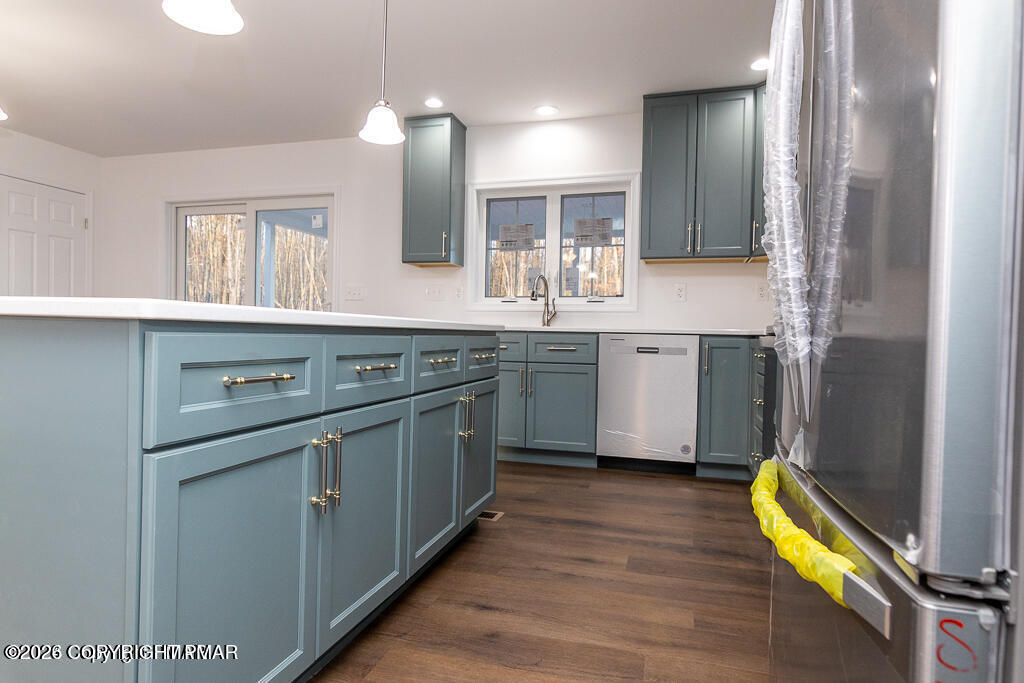 226 Apache Drive Effort, PA 18330 - Photo 7 of 30 a kitchen with a sink cabinets and wooden floor