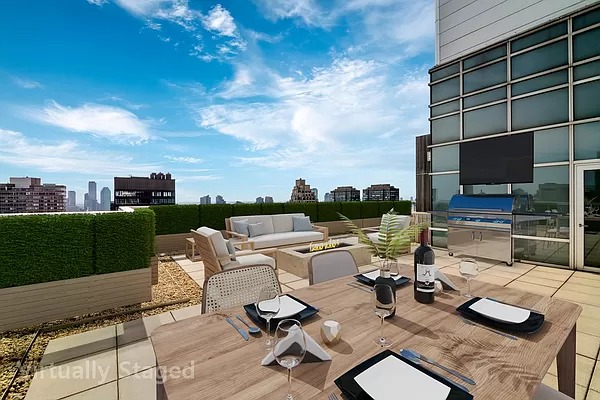 a roof deck with patio