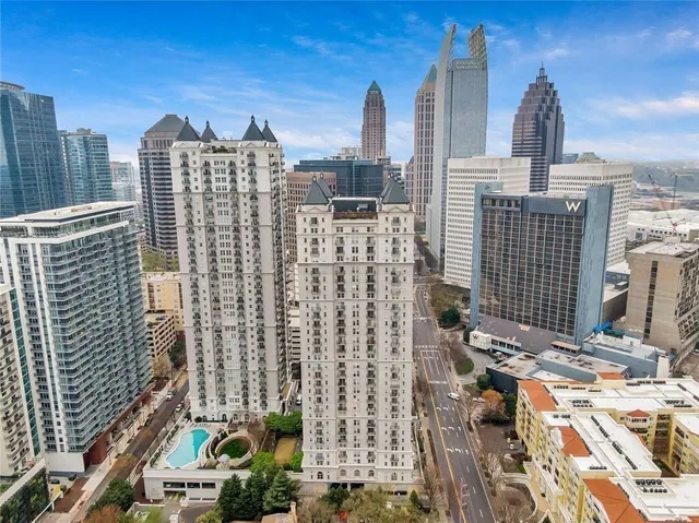 a view of city with tall buildings