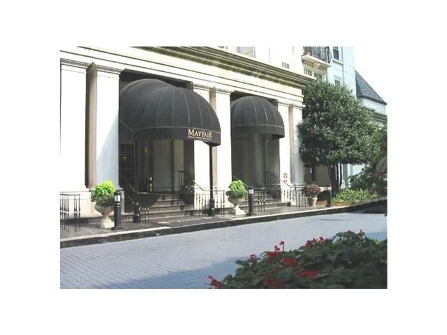 a black and white photo of a living room