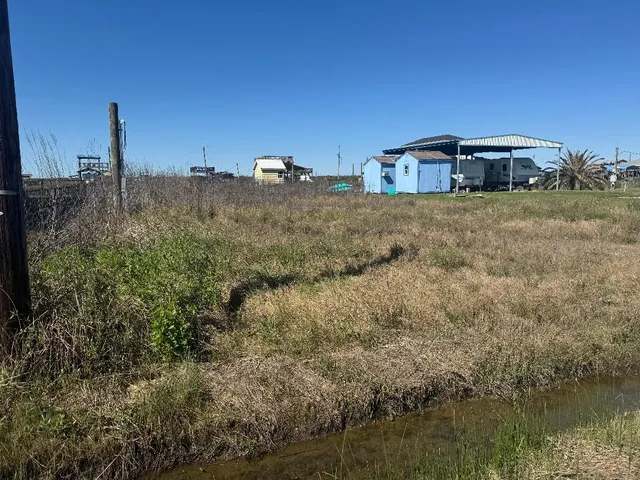 a house view with a lake