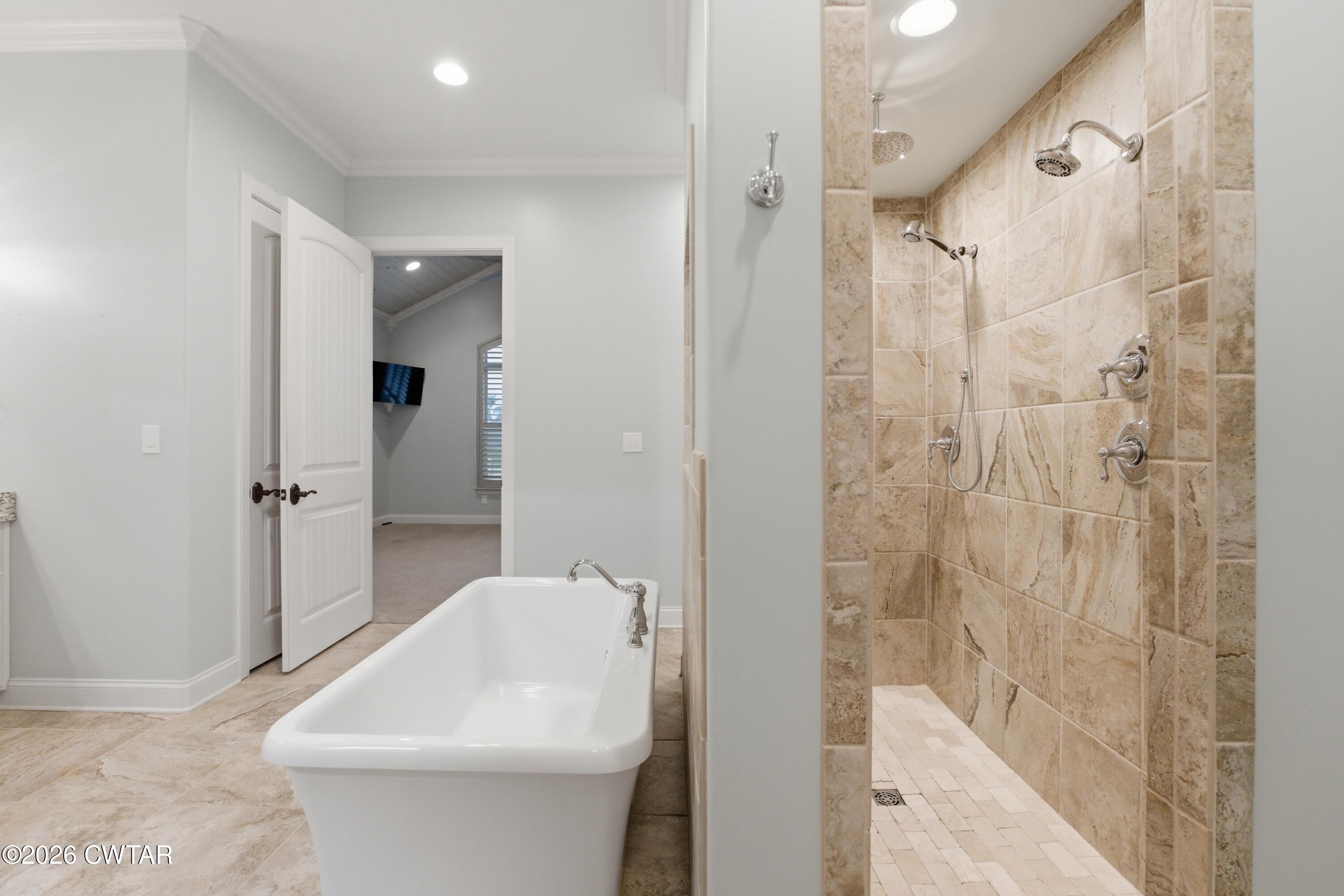 963 Ashport Road Jackson, TN 38305 - Photo 29 of 60 a bathroom with a toilet a sink and shower
