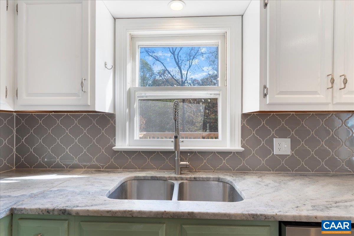 555 Gillums Ridge Road Charlottesville, VA 22903 - Photo 21 of 66 a kitchen with a sink and a window