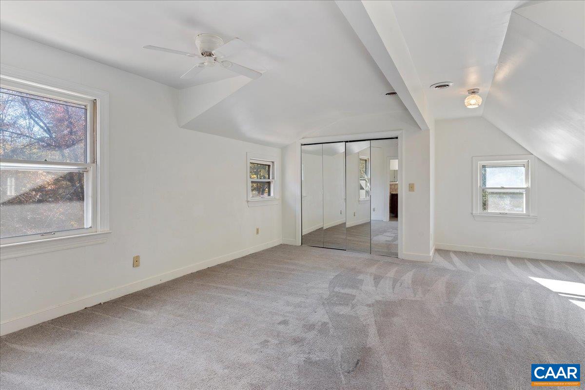 555 Gillums Ridge Road Charlottesville, VA 22903 - Photo 29 of 66 a view of an empty room with a window