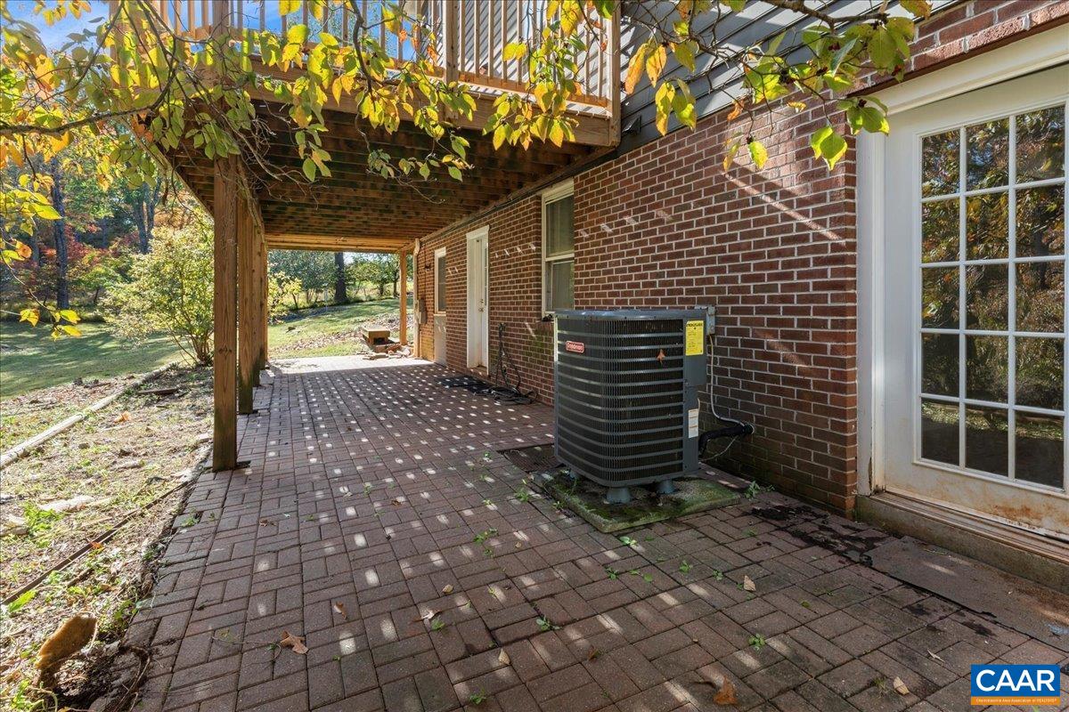 555 Gillums Ridge Road Charlottesville, VA 22903 - Photo 50 of 66 a front view of a house with a yard