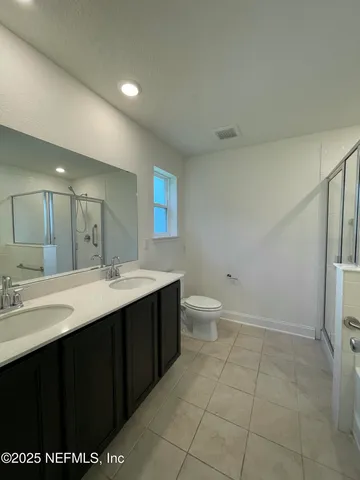 a view with a sink and a mirror