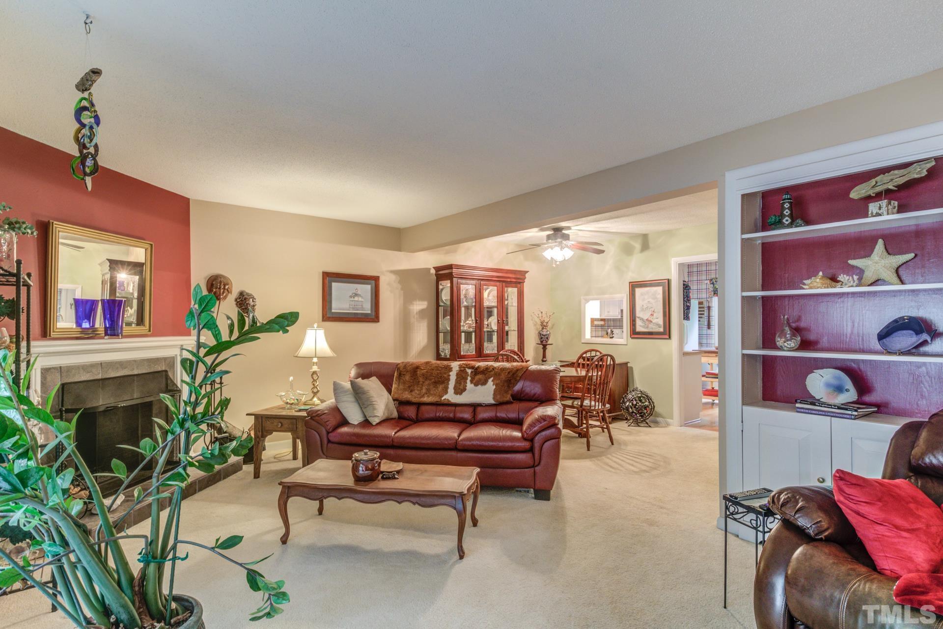 817 Green Ridge Drive Raleigh, NC 27609 - Photo 11 of 24 Large living room perfect for gathering with friends and family.