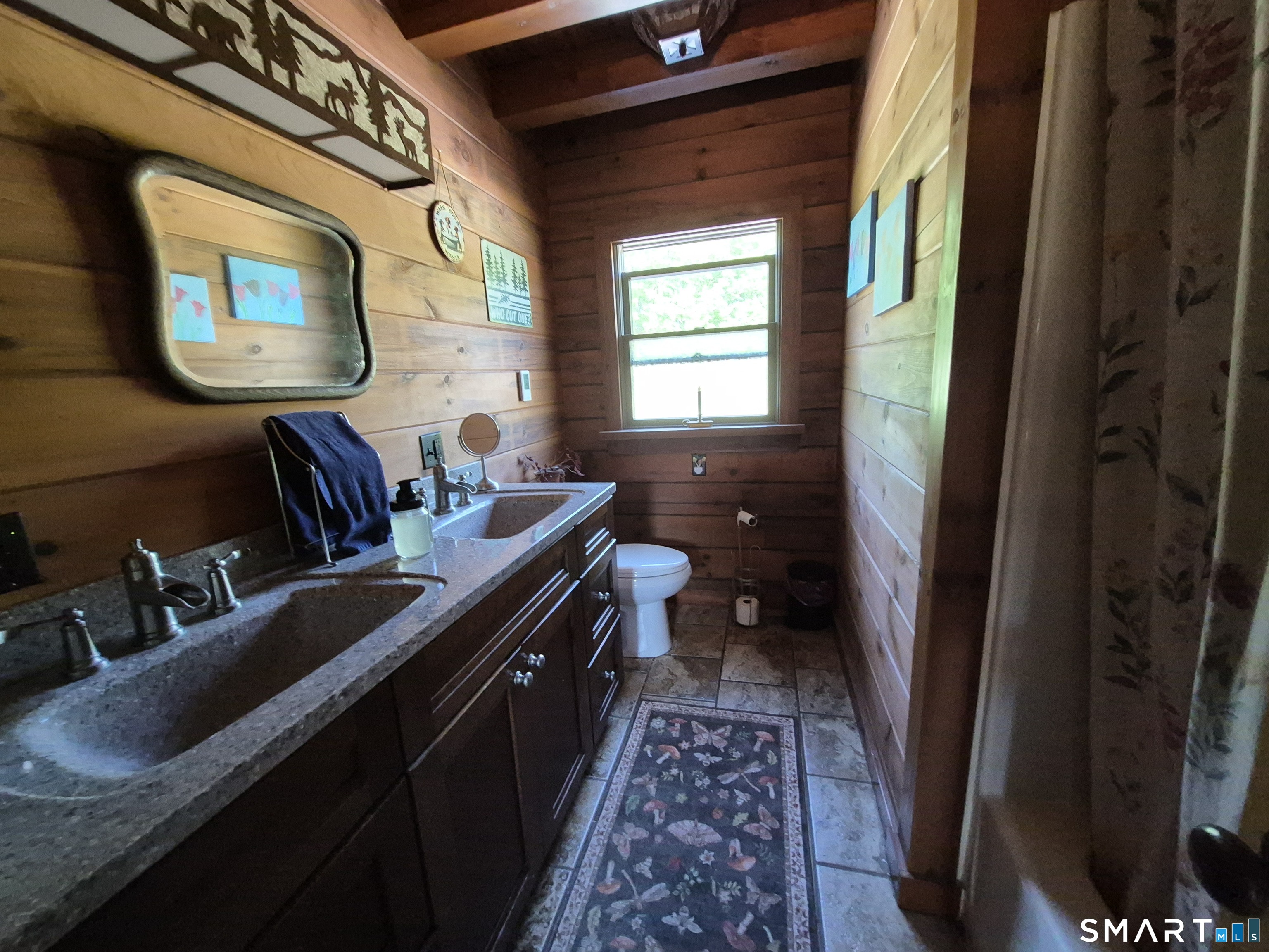 46 Cemetery Road Canterbury, CT 06331 - Photo 32 of 40 a bathroom with a double vanity sink and a mirror