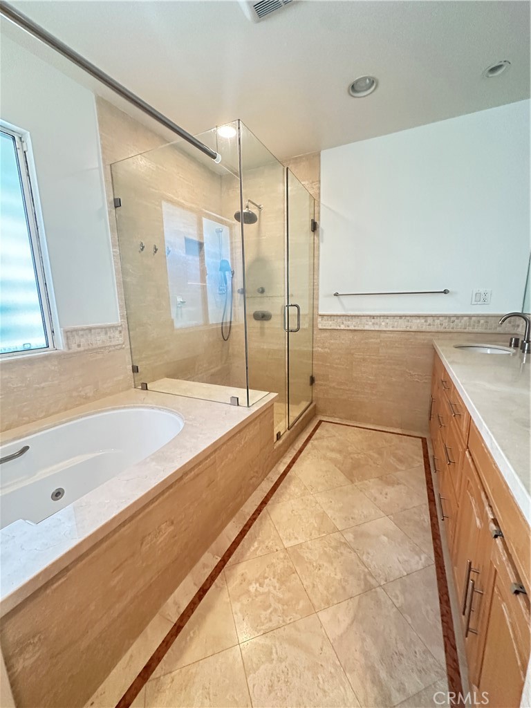 848 Monte Verde Drive Arcadia, CA 91007 - Photo 12 of 22 a spacious bathroom with a granite countertop sink a toilet a mirror and bathtub