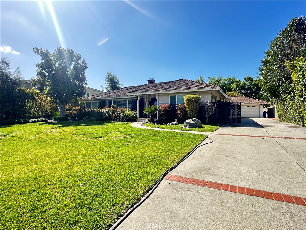 848 Monte Verde Drive Arcadia, CA 91007 - Photo 2 of 22 a front view of a house with yard and green space