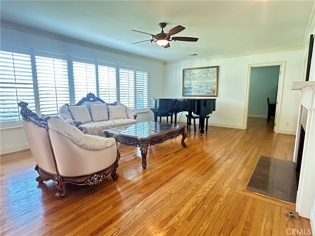 848 Monte Verde Drive Arcadia, CA 91007 - Photo 4 of 22 a living room with furniture and a wooden floor