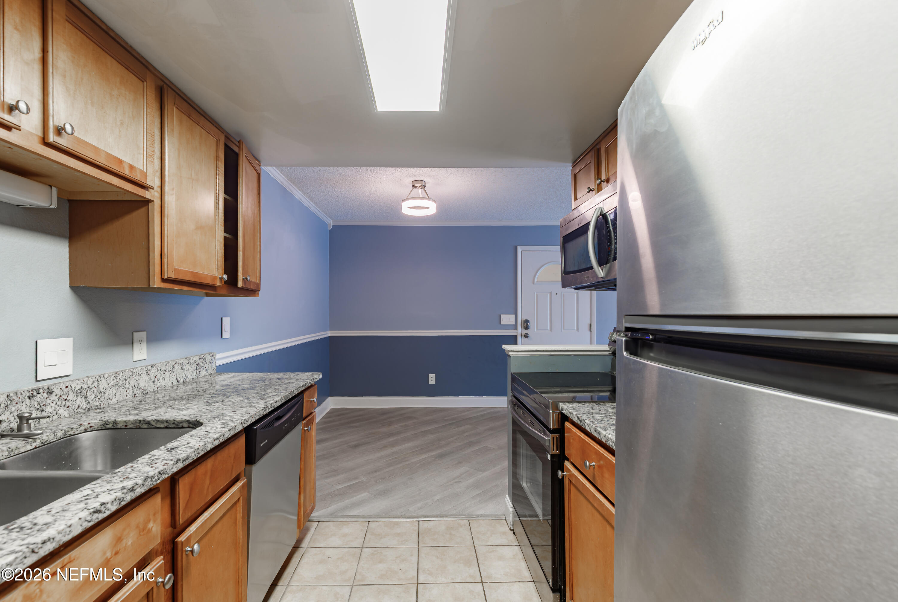 3737 Loretto Road, Unit 905 Jacksonville, FL 32223 - Photo 16 of 28 Kitchen to Dining Room