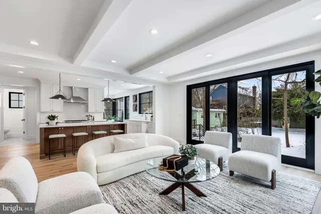 a bathroom with a double vanity sink mirror and shower