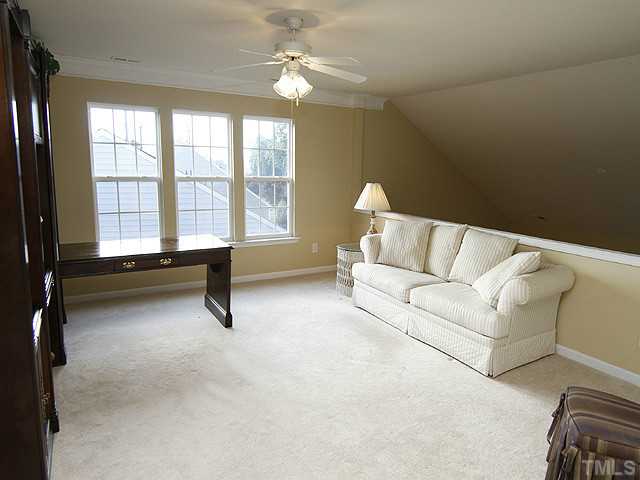 3805 Cathedral Bell Road Raleigh, NC 27614 - Photo 21 of 24 Here's your loft showing the view from the foyer overlook side. Imagine what you can do with this space. There's a large storage closet here as well, perfect for games or DVD's!