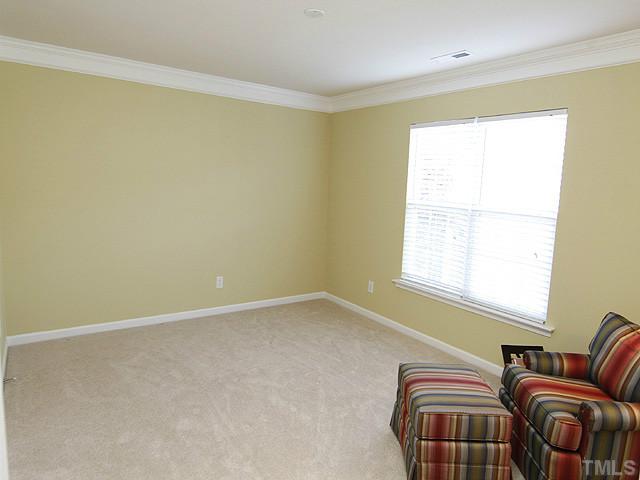3805 Cathedral Bell Road Raleigh, NC 27614 - Photo 22 of 24 This large bedroom also has a doorway to the upstairs full bath. Both extra baths are accessible either from their respective hallways, or the adjoining bedooms.