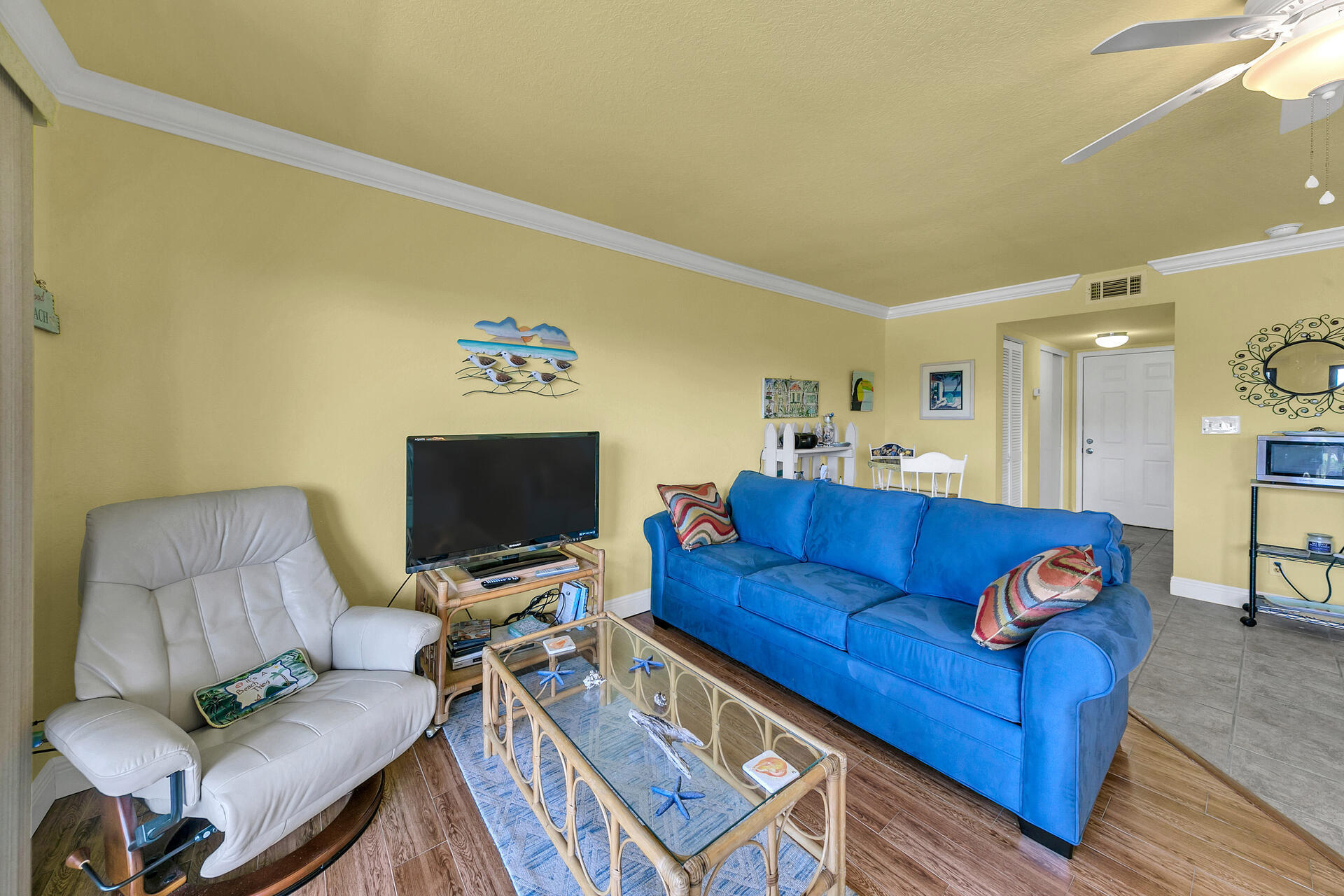 145 Beachfront Trail, Unit 202 Santa Rosa Beach, FL 32459 - Photo 14 of 26 a living room with furniture and a flat screen tv